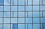 Facade of a modern glass building. Architectural detail.