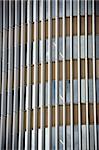 Glass facade of a modern office building. Architectural detail.