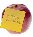 College Planning Concept with Apple and Note Isolated on White with a Clipping Path.