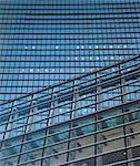 Blue abstract diagonal crop of modern office skyscraper