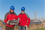 Engineers at Work In a Solar Power Station