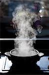 steam rising off a boiling pot