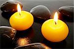 yellow candles in spa or bathroom for relaxation
