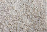 some raw rice forming a background pattern