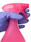 Purple Pink Gloved Hand on Spray Bottle Cleaning Concept.