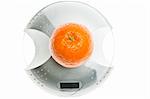 Orange fruit isolated on food scale