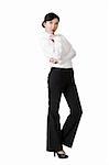 Confident business woman of Chinese, full length portrait isolated over white background.