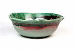 Green and red bowl on white background