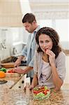 Lover couple cooking in the kitchen at home