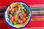 Pico de gallo tomato and chili Mexican sauce serape tablecloth