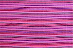 Mexican serape vibrant pink macro fabric texture background