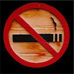 Wooden No Smoking Sign on isolated black background