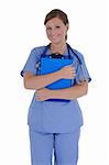 A attractive female nurse with a friendly smile standing holding a clipboard, isolated on a solid white background.