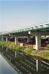 Modern bridge over river in daytime in Taipei, Taiwan, Asia.