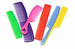 Assorted multicolor plastic combs on white background