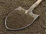 spade with heap of soil