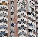 close-up on the wall with the windows of an apartment house