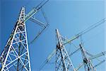 Electricity pylons on the sky background