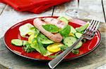 Lunch salad with grilled sausage and fresh vegetables