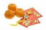 Chinese New Year ornament, oranges and red packets on white background