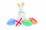 Easter bunny and decorated eggs on white background