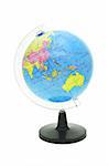 Plastic globe showing East Asia and Australia on white background