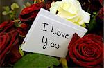 bouquet of roses with i love you card