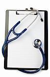 Note pad and stethoscope on a white background