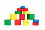 Color wooden building blocks on a white background