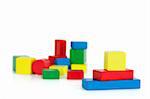 Color children's wooden blocks on a white background