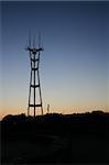 Radio towers photographed at sunset