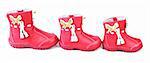 Red leather baby boots on white background