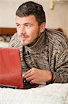 handsome man with laptop computer indoors