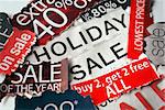 Various holiday on sale signs from the newspapers