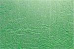 The green color paper texture and background