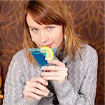 close up portrait of gorgeous girl with cocktail