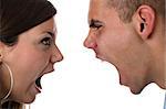 Heads of young man and woman yelling at each other in a fight, side view, isolated on white background