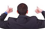 A businessman gives a thumbs up (back)