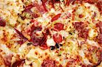 pizza with salami close up background