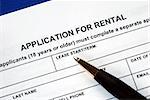 Signed the rental application with a pen