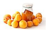 apricot jam in the pot and fresh ripe apricots