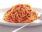 close up of a plate odf spaghetti noodles in tomato sauce