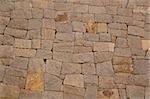 Wall made out of chiseled stacked stones