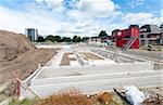 construction site with large foundation of a new building