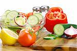 Composition with vegetable salad bowl and salad ingredients