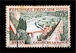 FRANCE - CIRCA 1963. Vintage canceled postage stamp with town of Dinan and river Rance illustration, circa 1963.