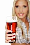 Beautiful and sexy young blond smiling woman giving beer, isolated on white