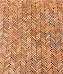 Ancient Red Brick Floor Tiles in Traditional Pattern