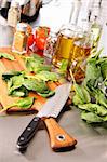 Preparing spinach  leaves on cutting board