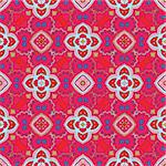 Cheerful, seamless and colorful floral pattern with swirls on a bright red background